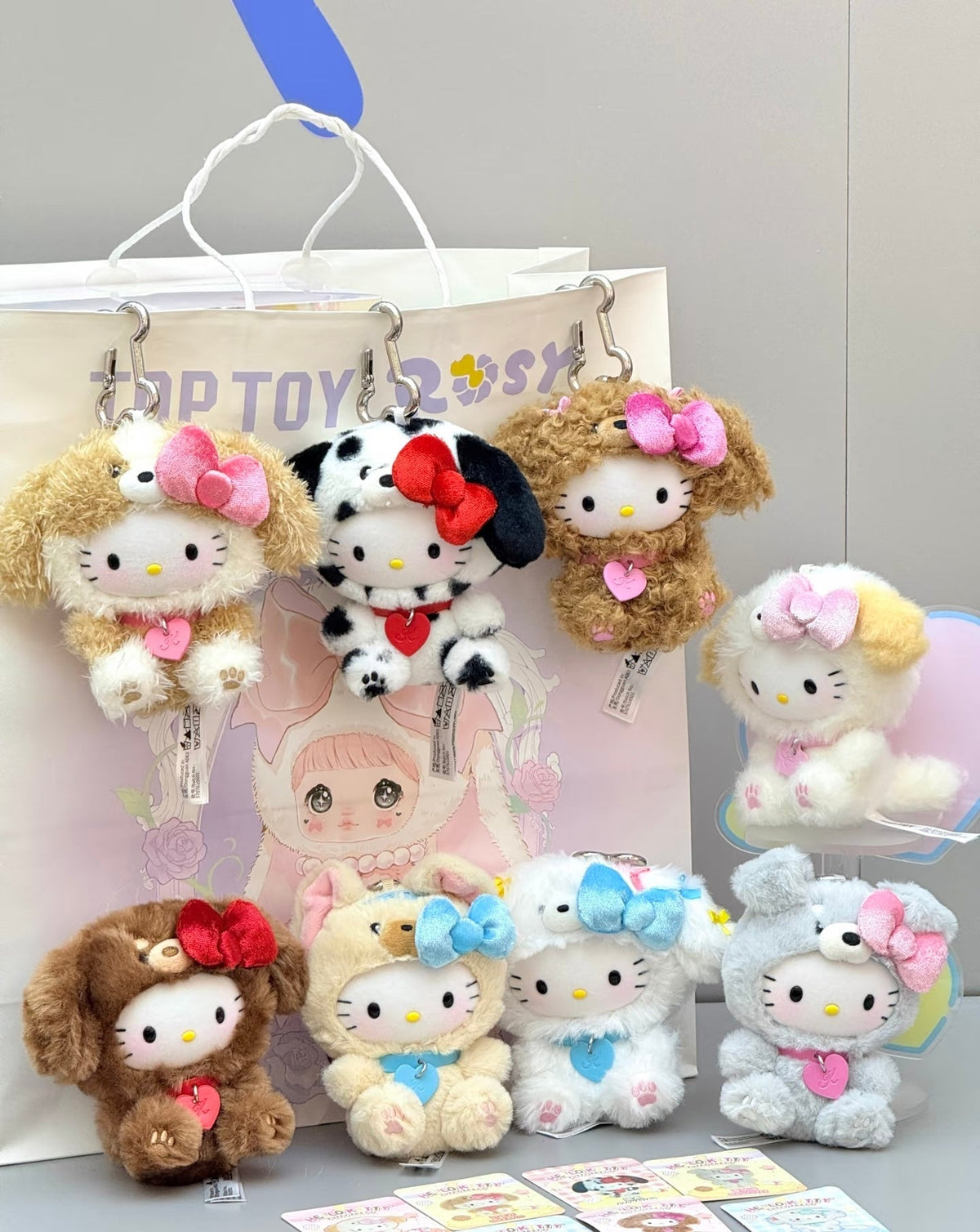 A Tiny Puppy Party to Take Everywhere: TOPTOY Hello Kitty Plush Pendant Blind Box